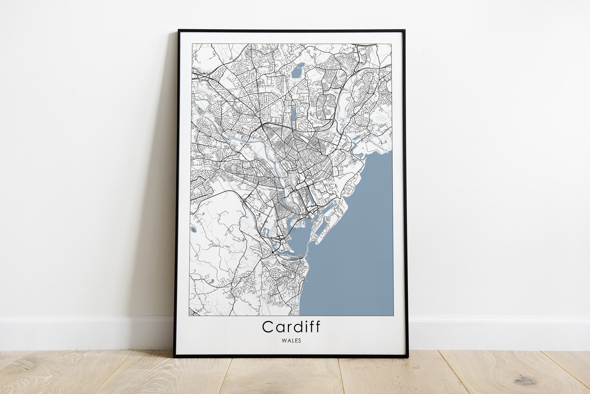 Cardiff city map print in black and white and blue sea.